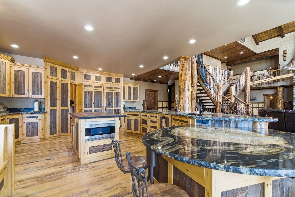 Riverfront Wildlife Lodge — chef's kitchen with three islands and double ovens