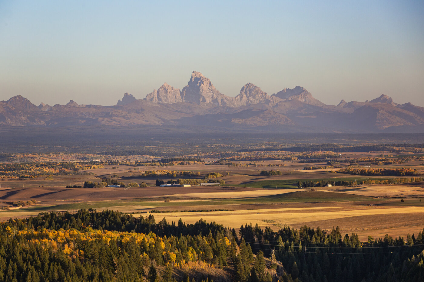 Teton View Retreat — West Cabin — view of the Teton range from the property at sunset