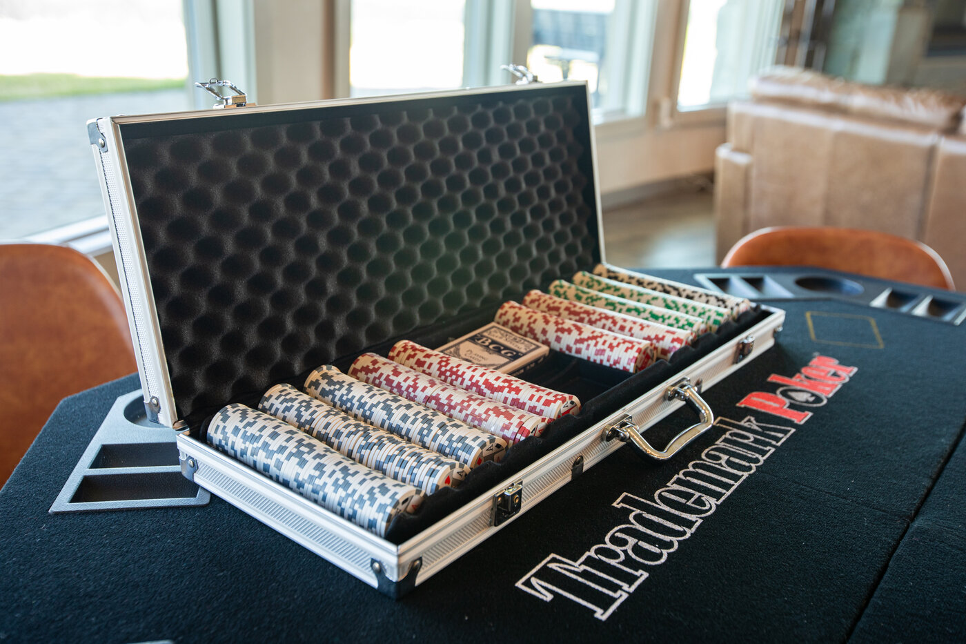 Teton View Retreat — West Cabin — premium poker chip set on a felt-top game table