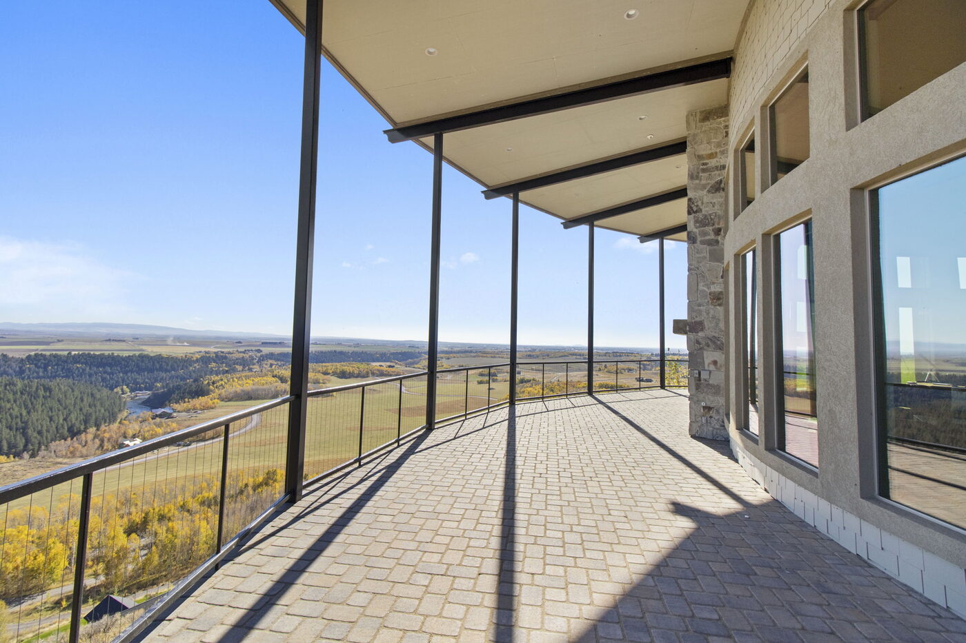 Teton View Retreat — West Cabin — wraparound balcony overlooking the valley fields