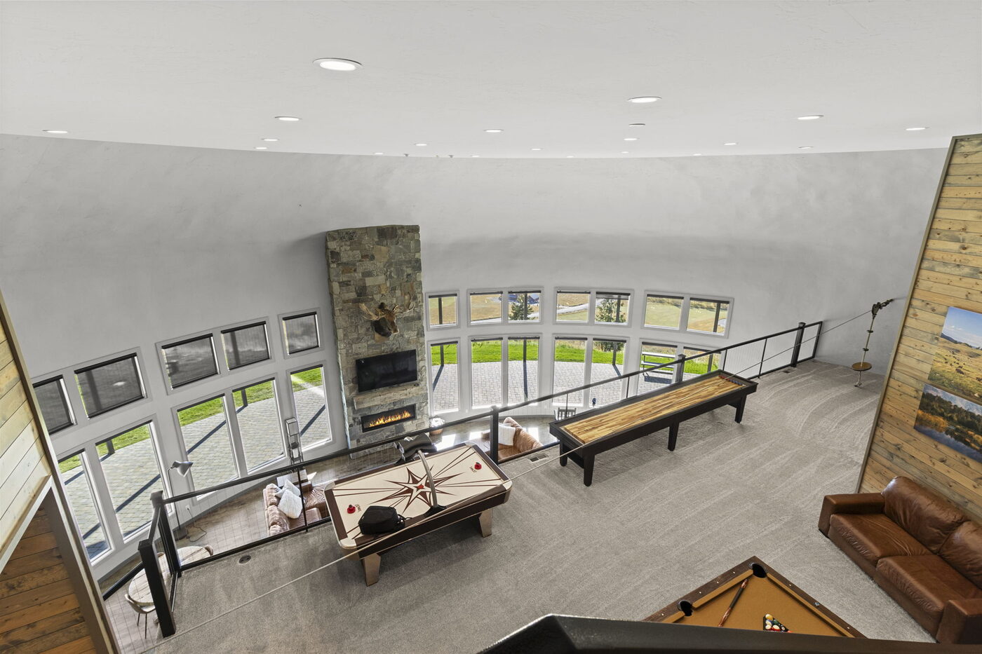Teton View Retreat — West Cabin — game room overlooking the great room from the dome's second floor