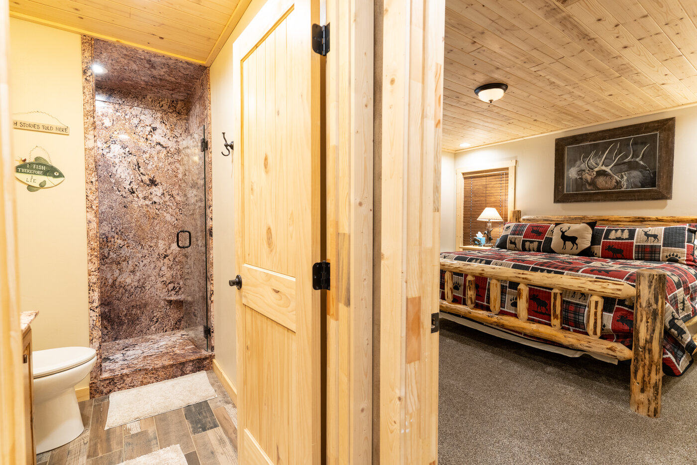 Trails End Lodge — ensuite bathroom with quartz shower visible through the bedroom doorway