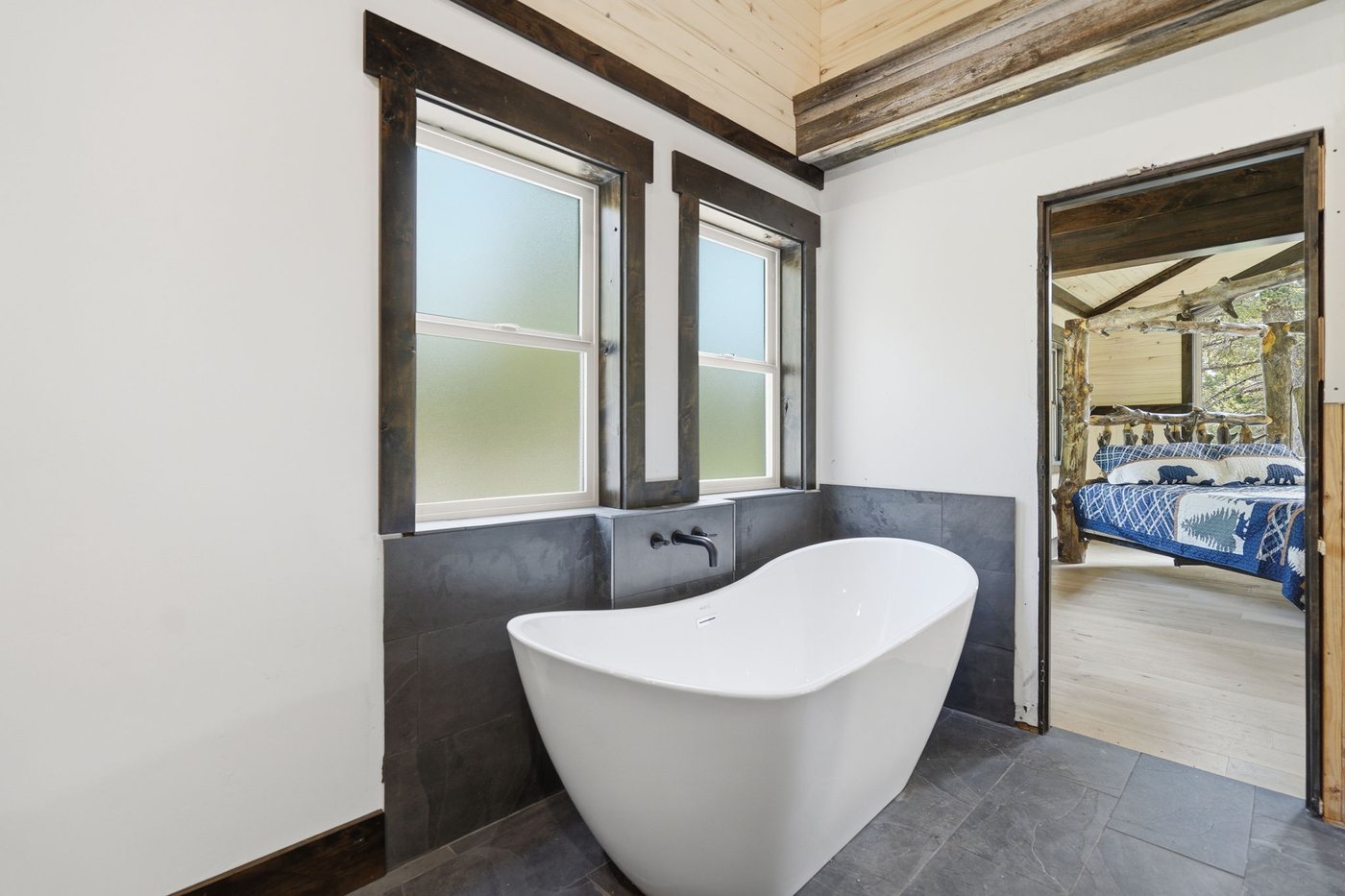 The Treehouse — second master bath with freestanding tub