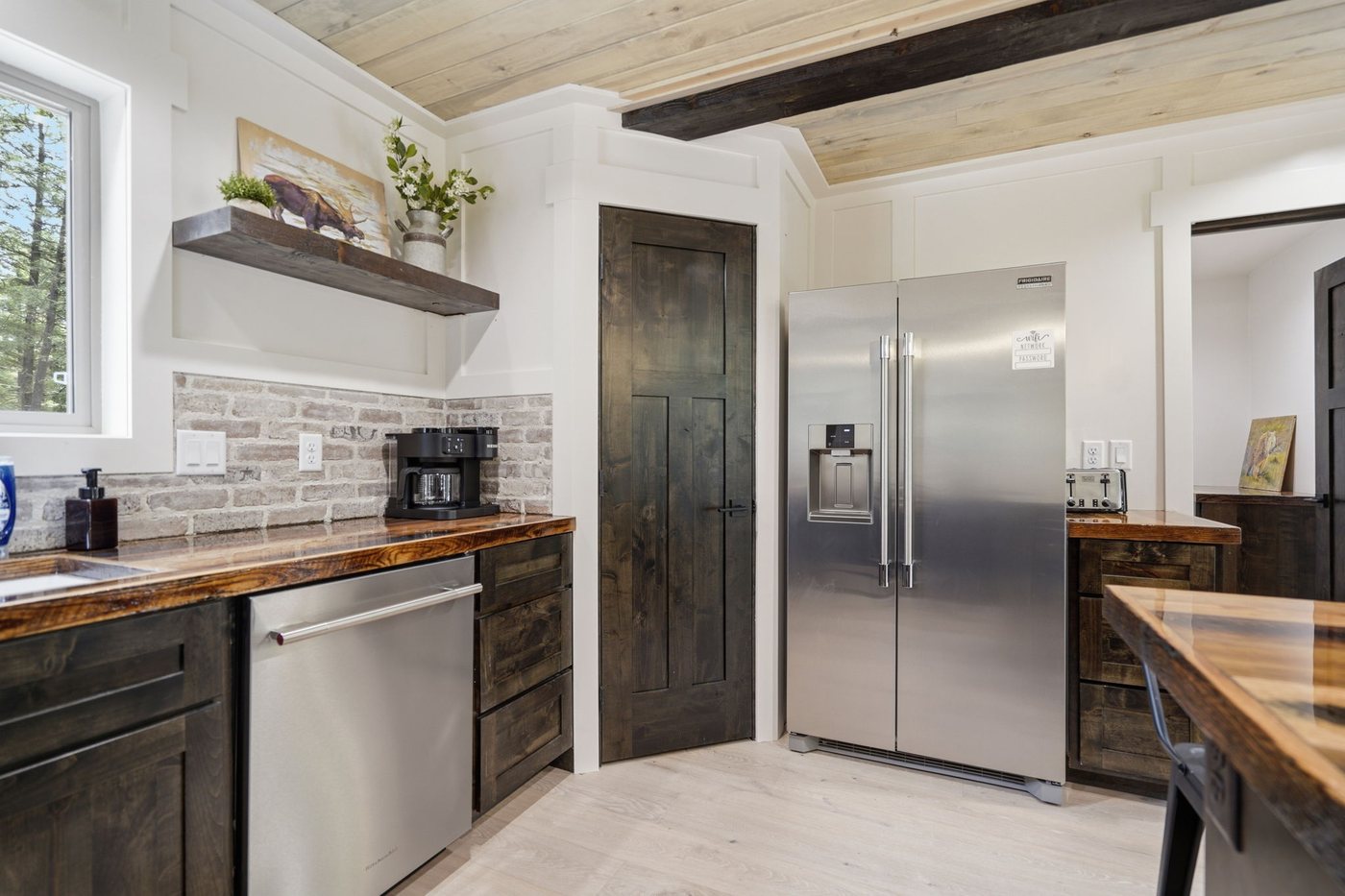 The Treehouse — kitchen with full-size refrigerator and prep counter