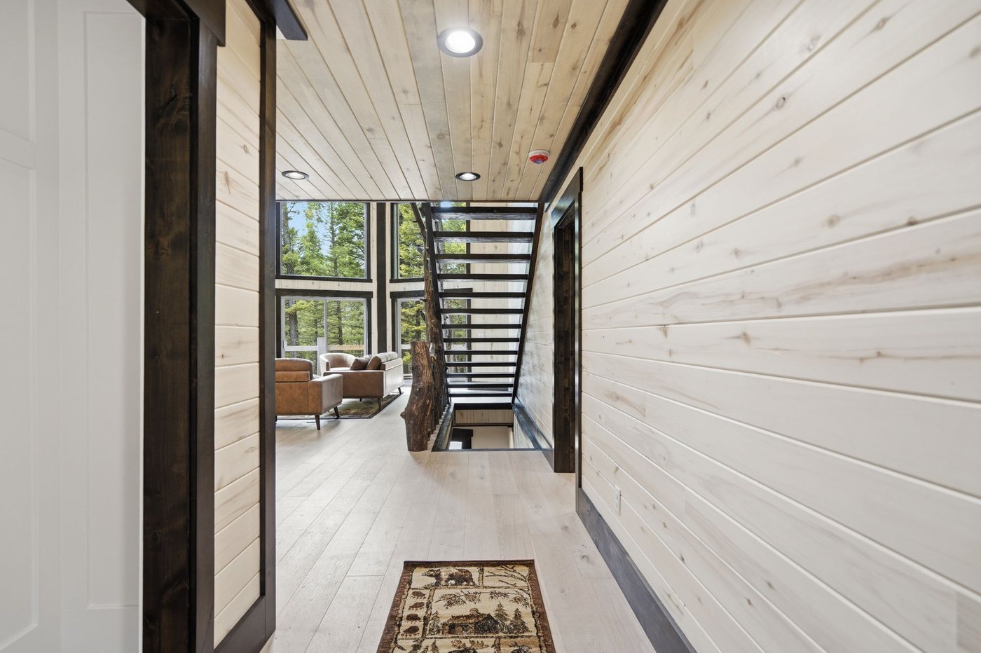 The Treehouse — entry hallway with shiplap walls